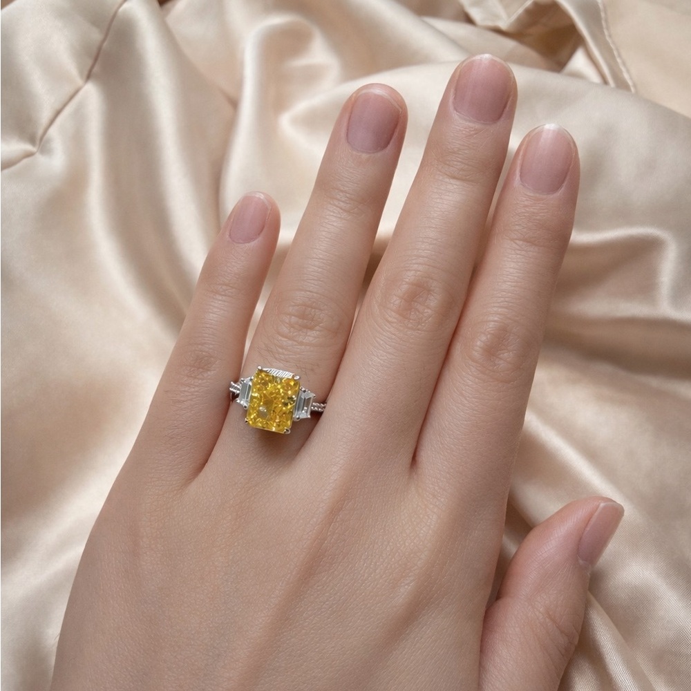 Radiant Cut Yellow Ring with Trapezoid Side Stones, Three-Stone Engagement Ring